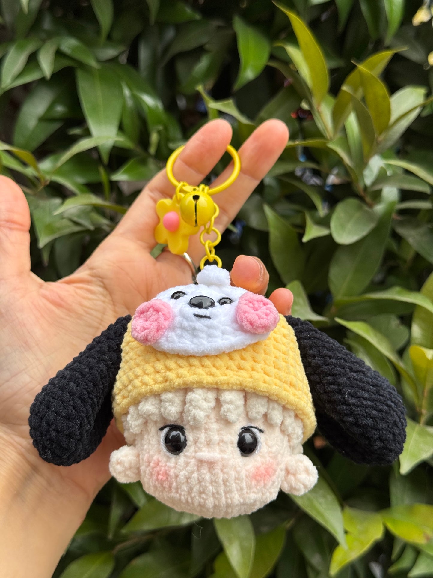 a cute dog crochet keychain inspired by BT21 Chimmy