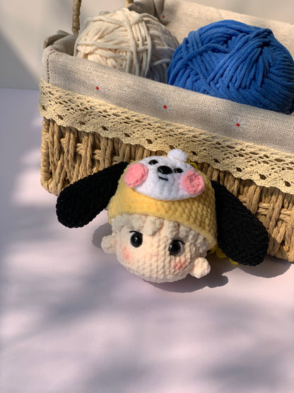 BTS Jimin crochet keychain in front of yarn balls