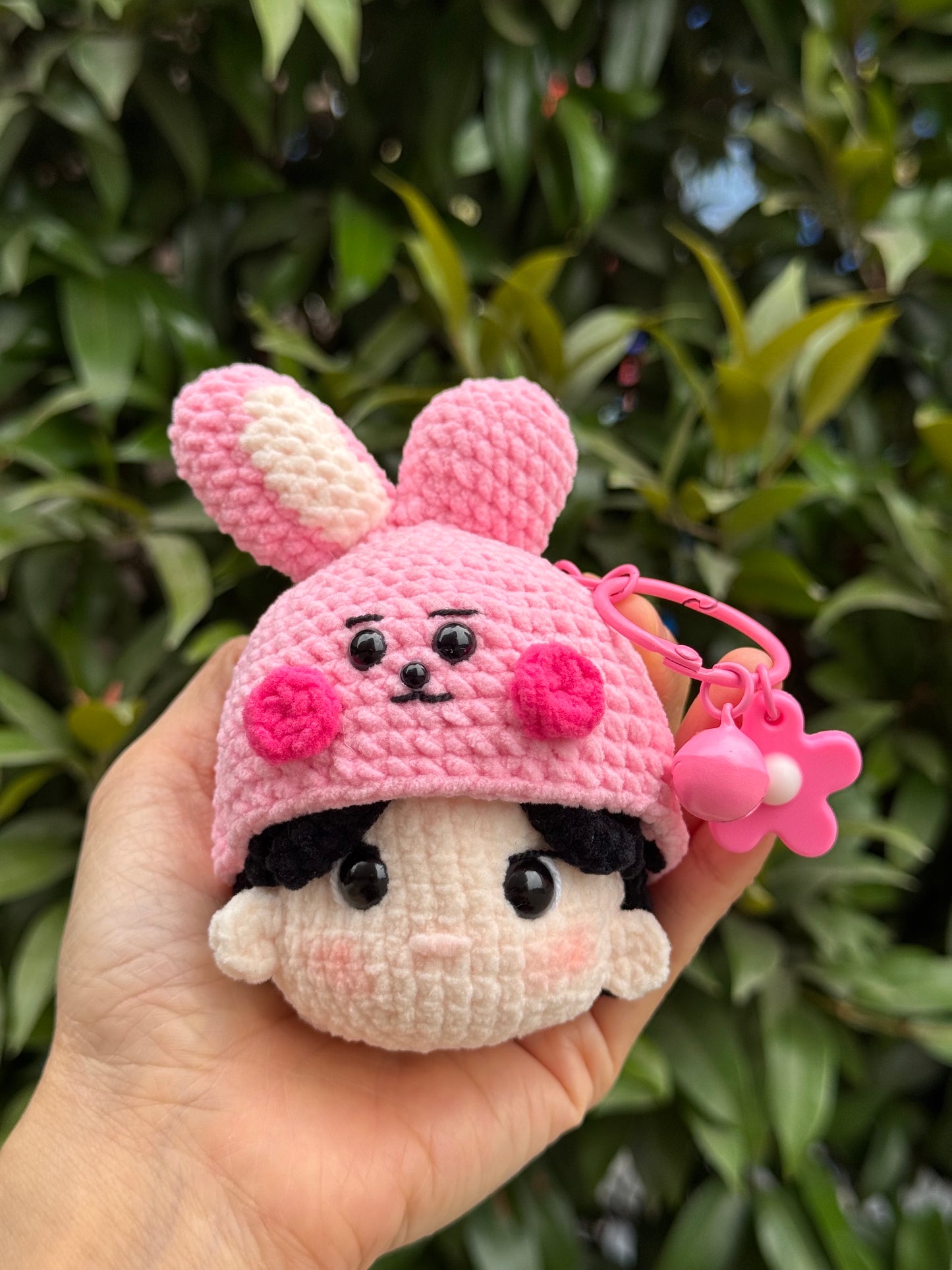 Hand holding BT21 Cooky Crochet keychain