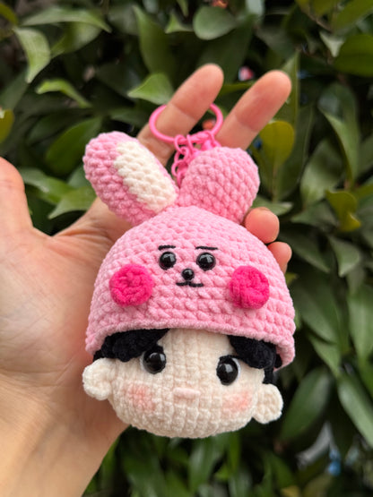 Holding BTS JungKook crochet keychain inspired by BT21 Cooky, a gift for ARMY, BTS fans