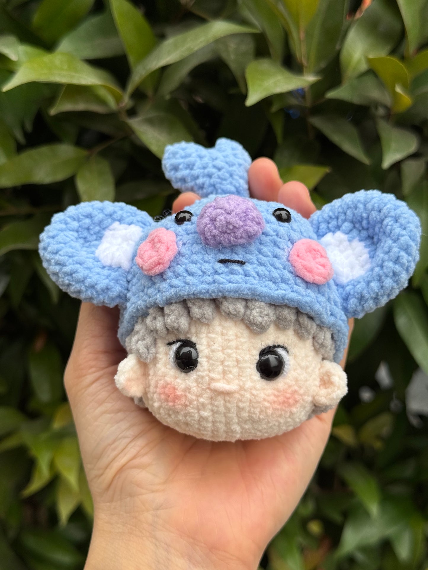 Hand holding BT21 Koya Crochet keychain