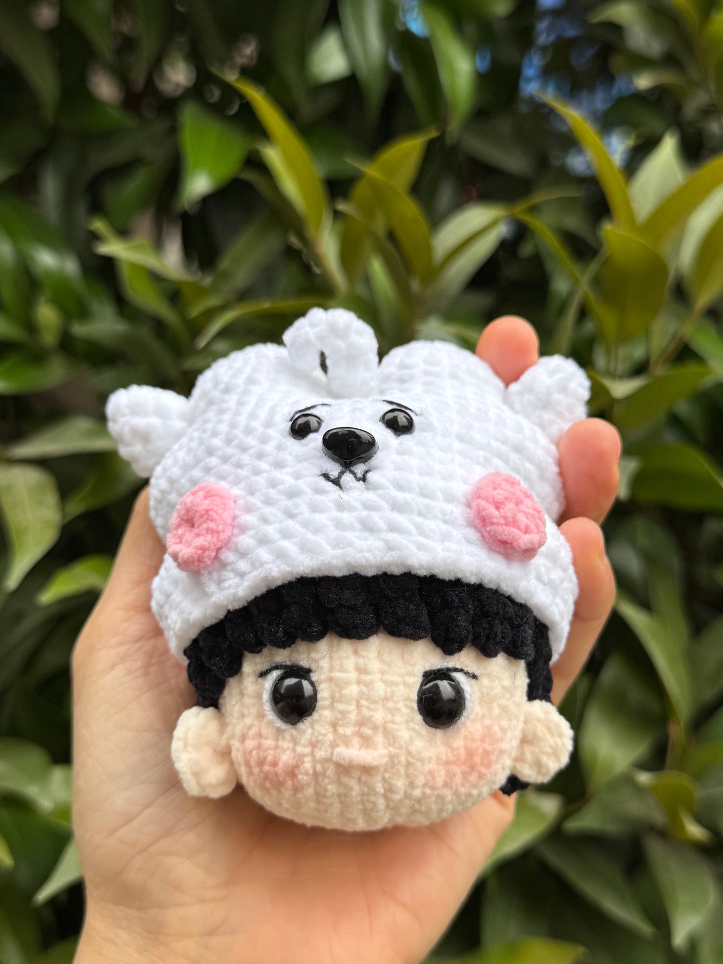 Hand holding BT21 RJ Crochet keychain