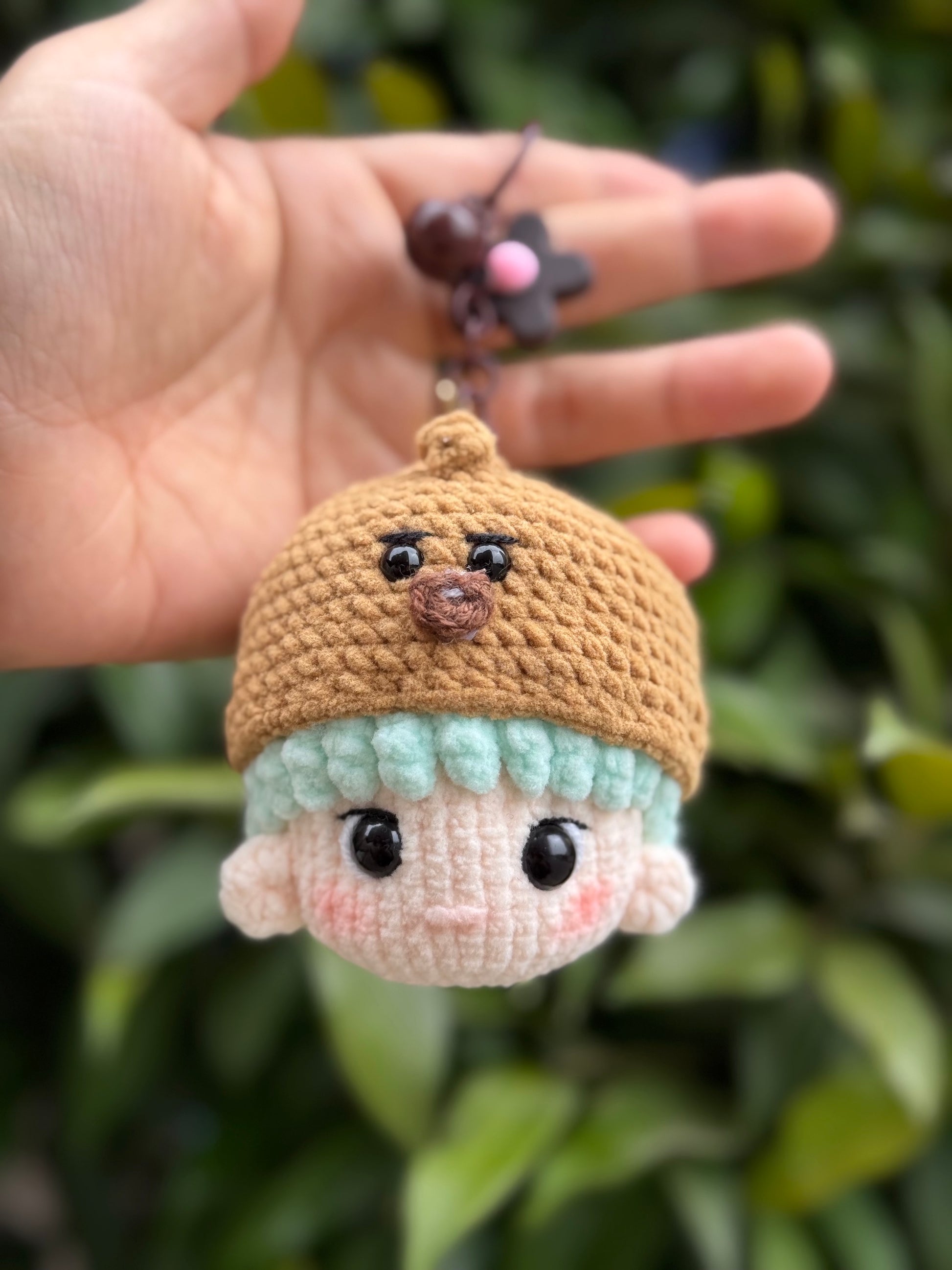 Handmade BT21 Shooky crochet keychain, a BTS keychain inspired by BTS Suga, made with Chenille yarn
