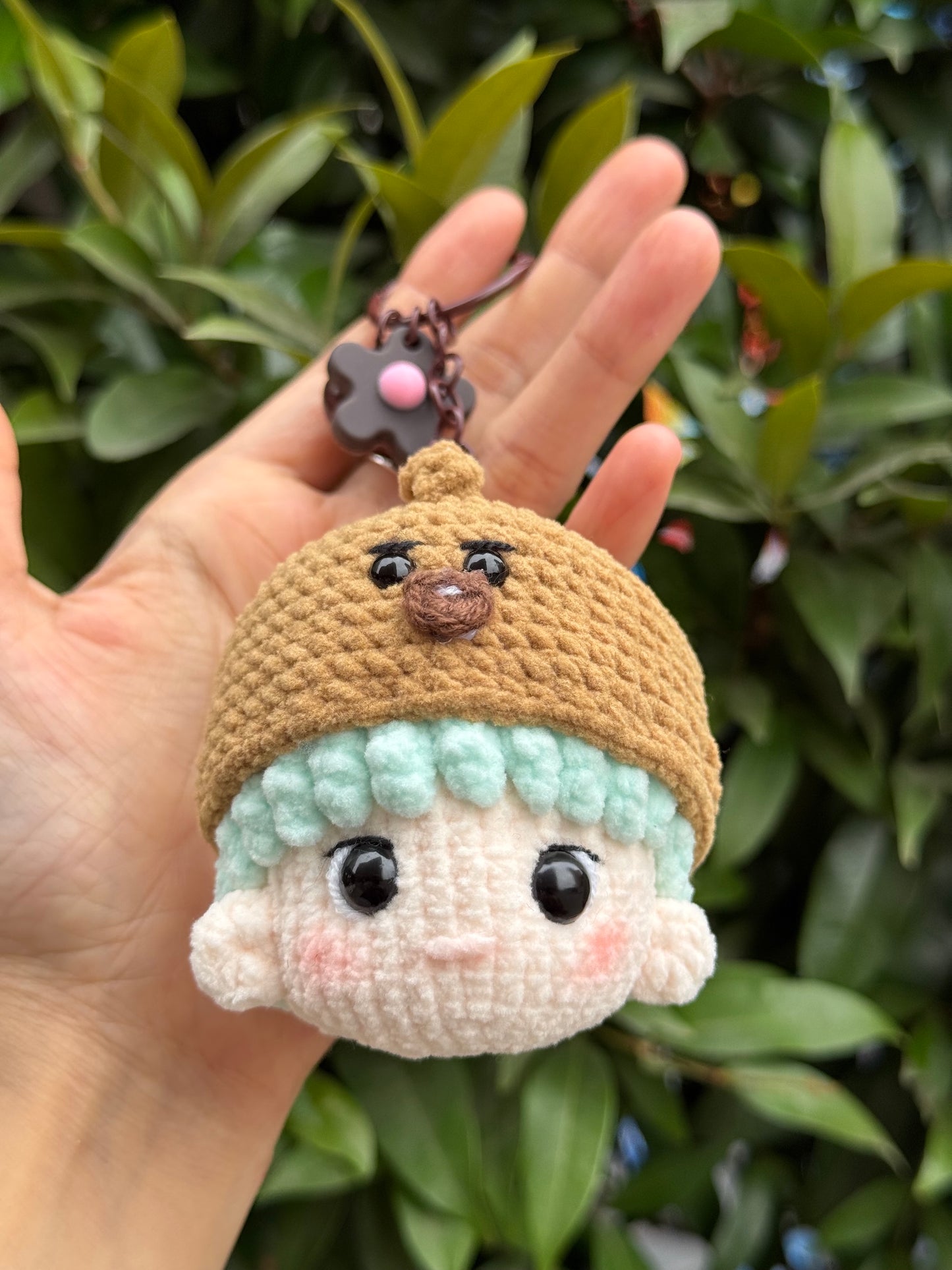 Holding BTS crochet keychain inspired by BT21 Shooky crochet, gift for ARMY, BTS fans, birthday gift
